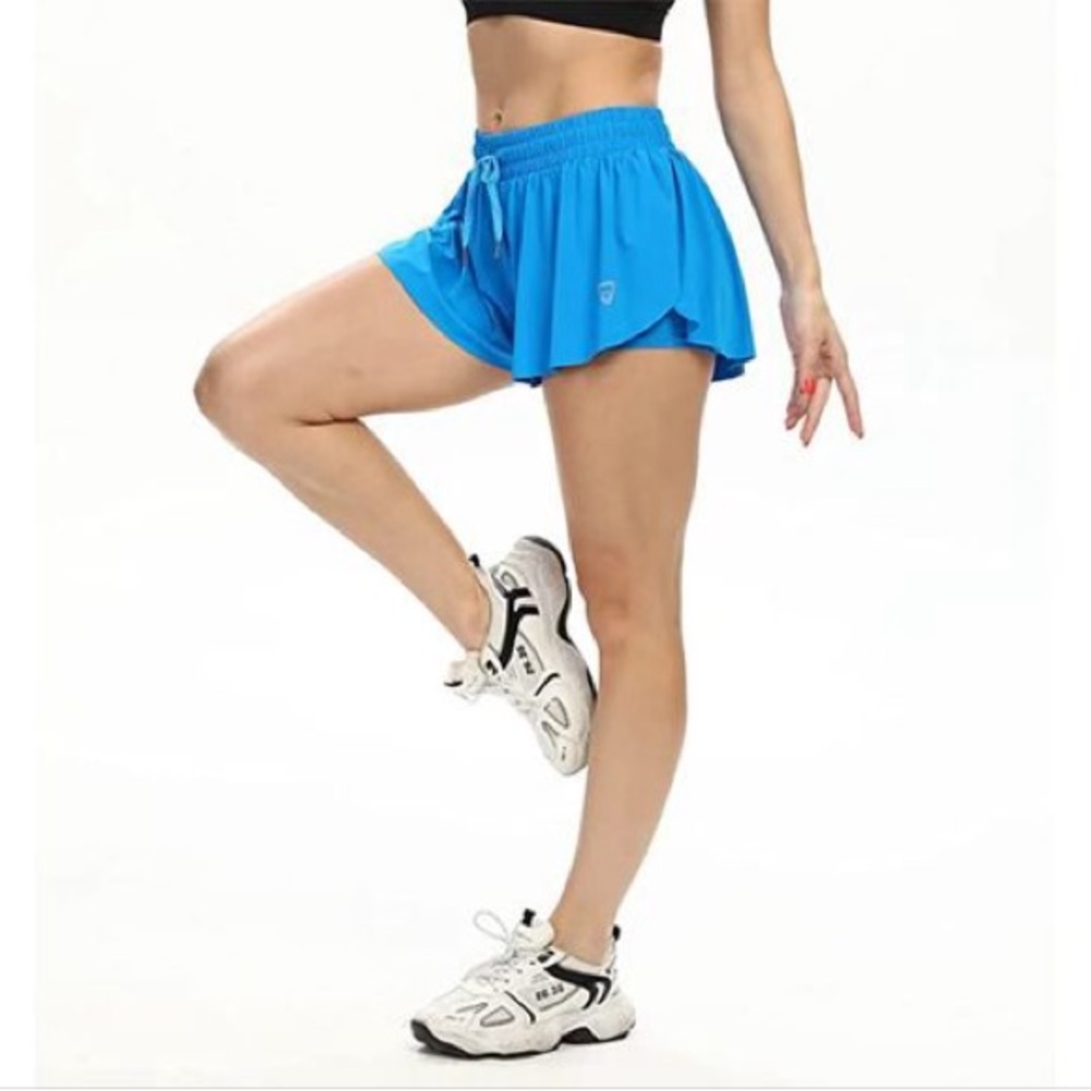 Luogongzi electric blue glowy shorts. Has phone pocket. Size S. Color sold out